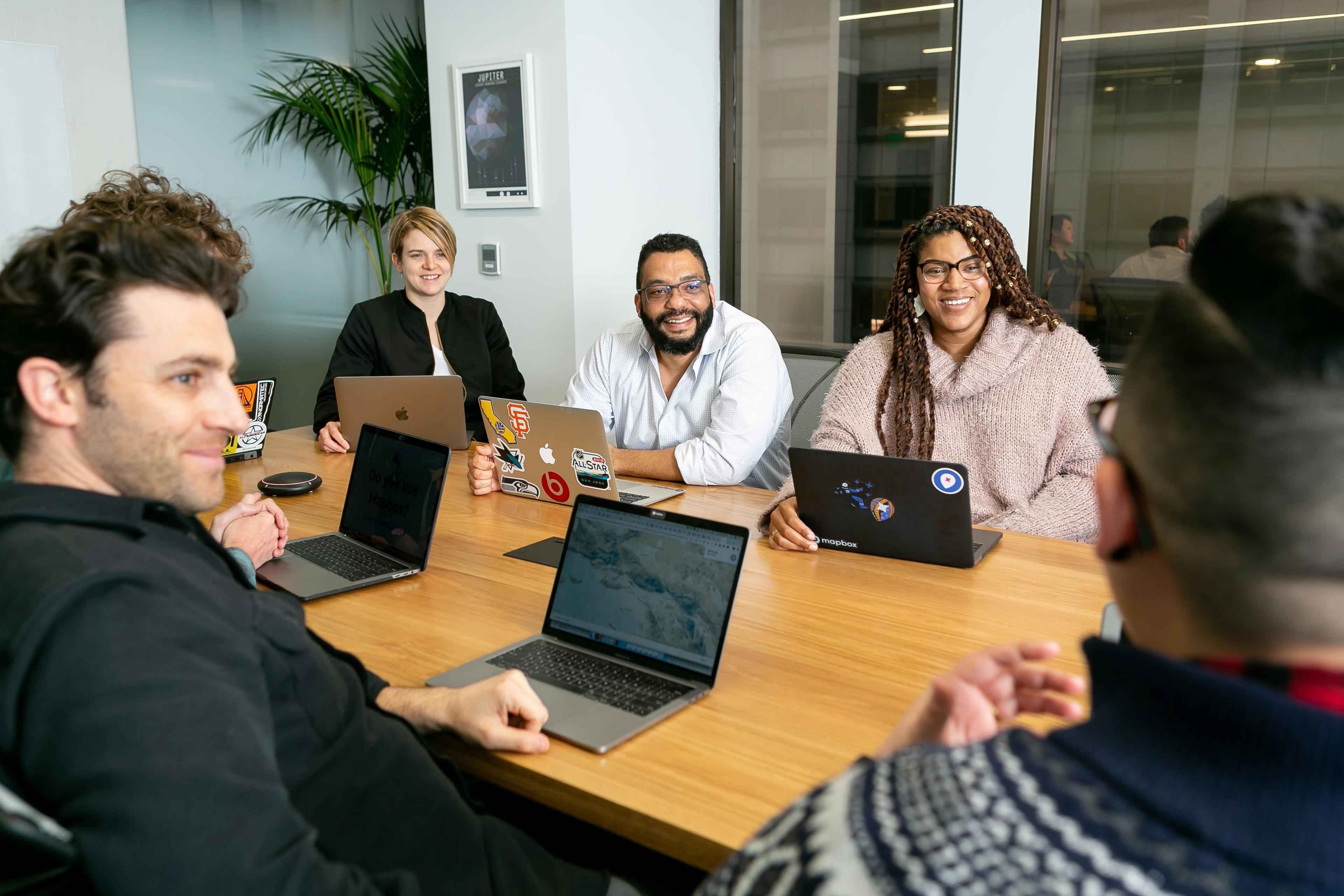Photo — colleagues around a table